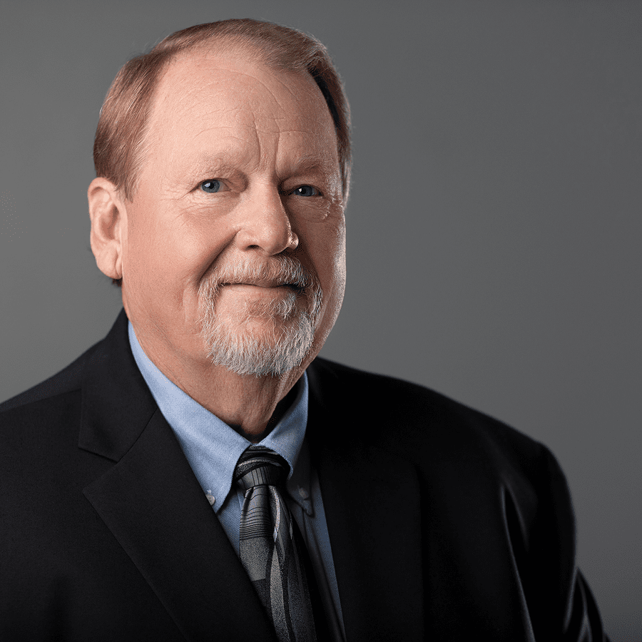 Smiling older man in suit and tie