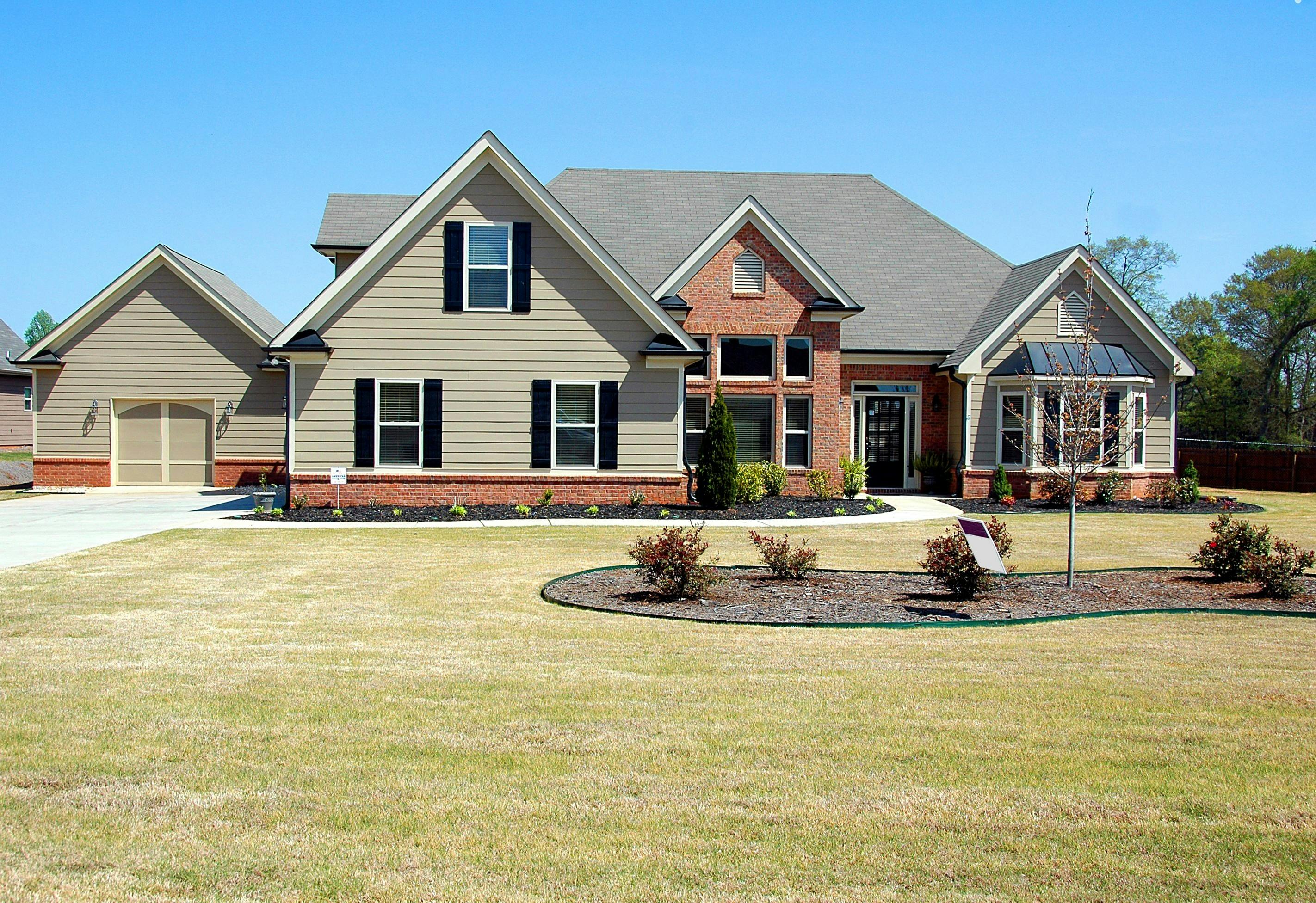 Large suburban brick and siding home