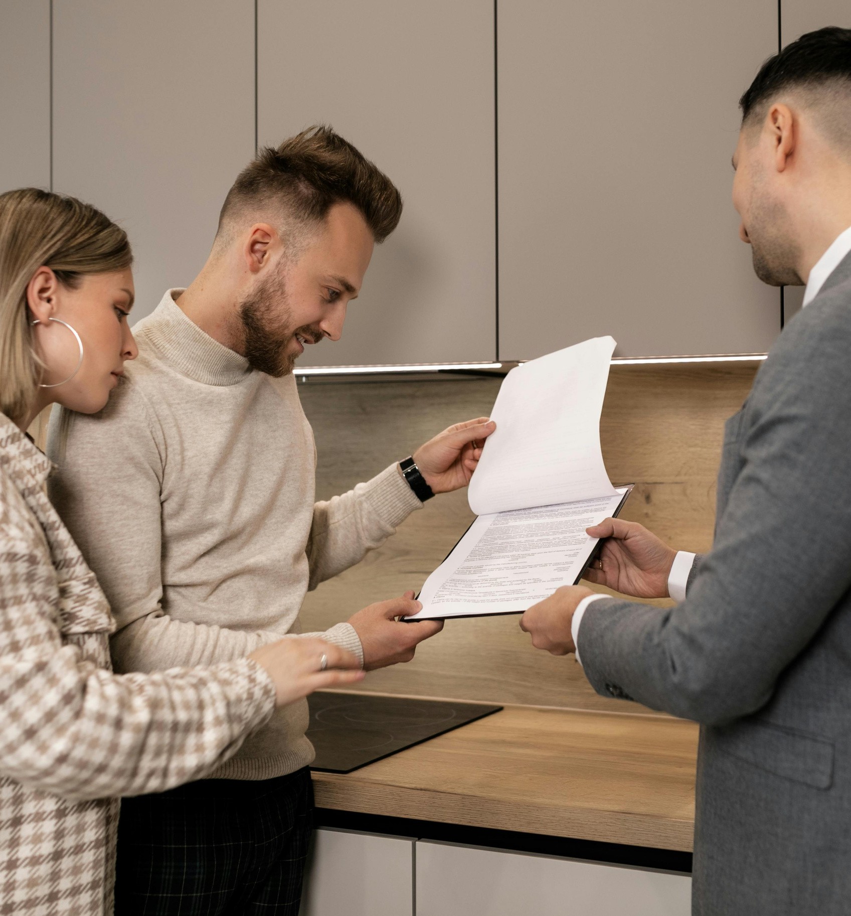 Realtors explaining property details to buyers in Willis TX