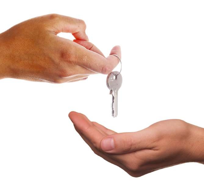 Hand passing key to open hand